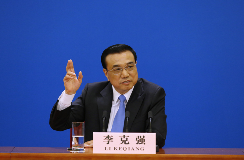 3月15日，國務(wù)院總理李克強在北京人民大會堂與中外記者見面，并回答記者提問。 新華社記者 沈伯韓 攝