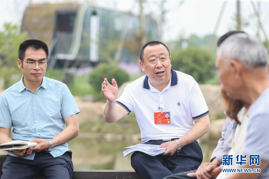 （新華全媒頭條·兩會精神看落實·圖文互動）（2）整體謀劃、系統(tǒng)升級、全面提升——落實全國兩會精神織牢織密公共衛(wèi)生防護網