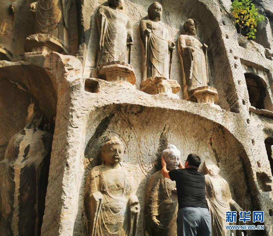 （圖文互動）（4）合體了，龍門石窟流散佛首首次實現(xiàn)“數(shù)字復(fù)位”