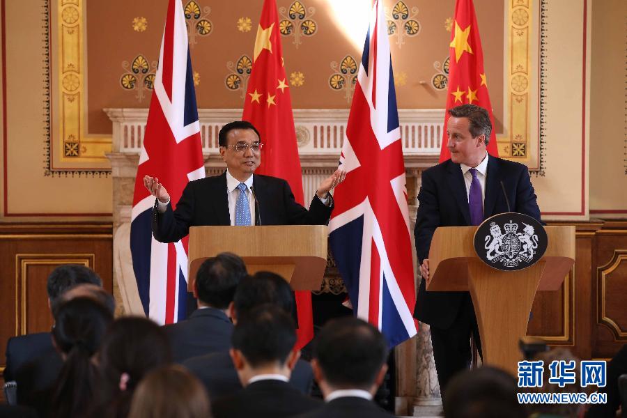 6月17日，國(guó)務(wù)院總理李克強(qiáng)同英國(guó)首相卡梅倫在倫敦舉行中英總理年度會(huì)晤后共同會(huì)見記者。新華社記者 龐興雷 攝