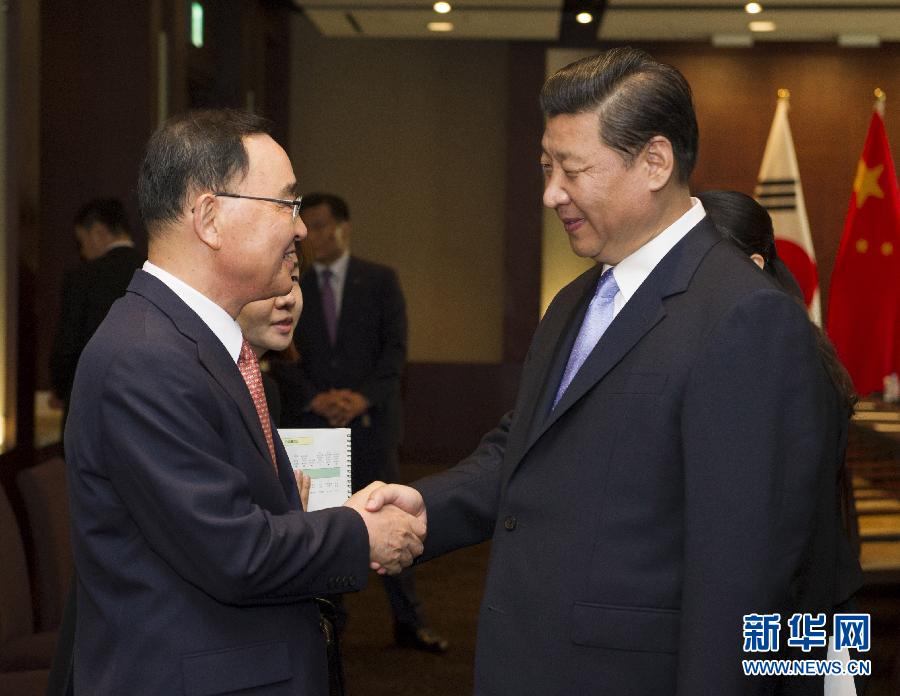 7月4日，國家主席習(xí)近平在首爾會(huì)見韓國總理鄭烘原。 新華社記者謝環(huán)馳攝  
