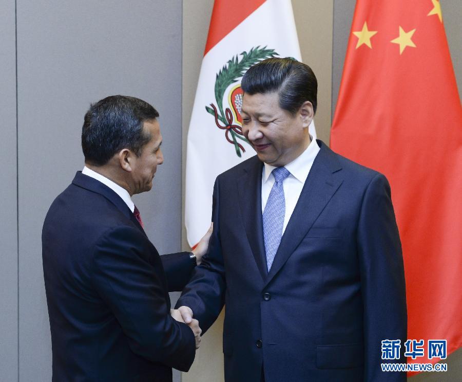7月16日，國家主席習近平在巴西首都巴西利亞會見秘魯總統(tǒng)烏馬拉。新華社記者 劉建生 攝 