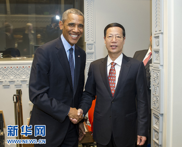 9月23日，國家主席習(xí)近平特使、國務(wù)院副總理張高麗在紐約會見出席聯(lián)合國氣候峰會的美國總統(tǒng)奧巴馬。 新華社記者王曄攝