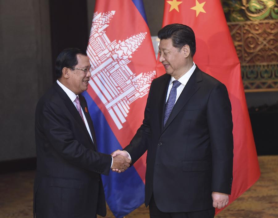 4月23日，國家主席習(xí)近平在雅加達(dá)會見柬埔寨首相洪森。新華社記者張鐸攝 