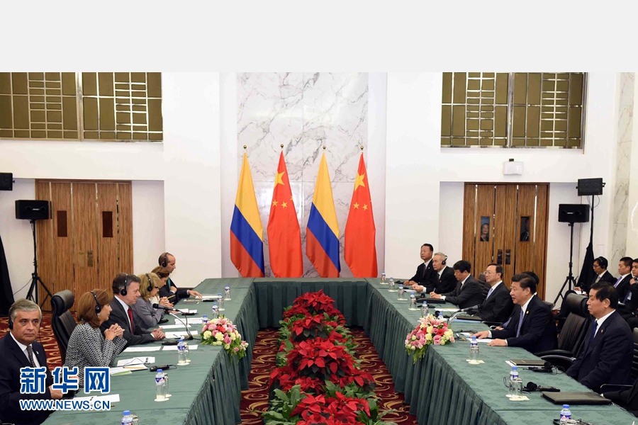 11月18日，國家主席習(xí)近平在菲律賓馬尼拉會見哥倫比亞總統(tǒng)桑托斯。 新華社記者 饒愛民 攝