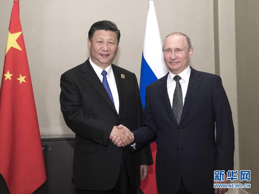 6月8日，國(guó)家主席習(xí)近平在阿斯塔納會(huì)見俄羅斯總統(tǒng)普京。 新華社記者蘭紅光 攝